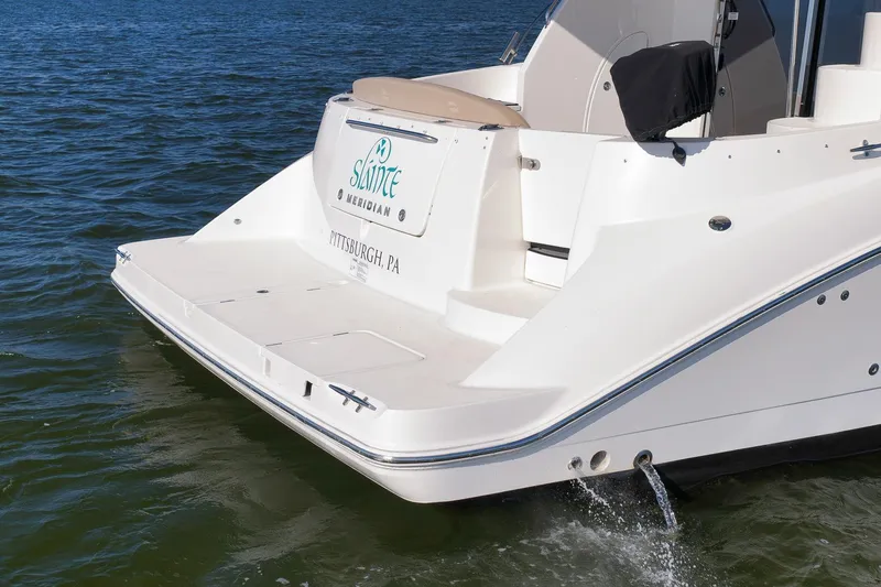 Slide: The Image of 2012 Meridian 441 Sedan yacht on water, rear view, Pittsburgh, PA. - 25