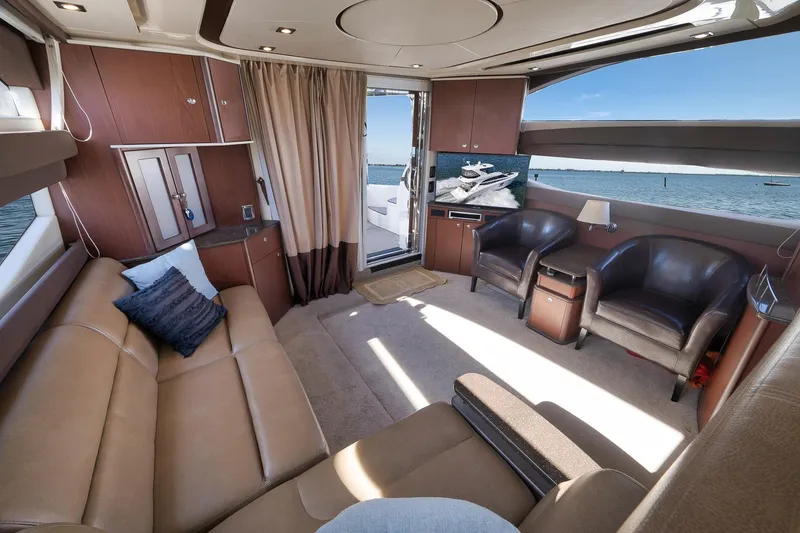 Slide: The Image of Luxurious interior of 2012 Meridian 441 Sedan yacht with leather seating and ocean view. - 40