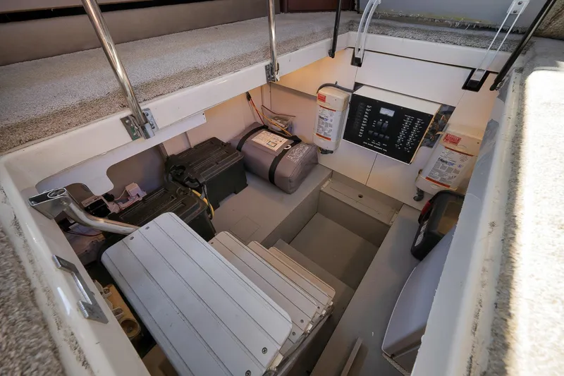 Slide: The Image of Engine room of 2012 Meridian 441 Sedan yacht with control panel and equipment. - 48