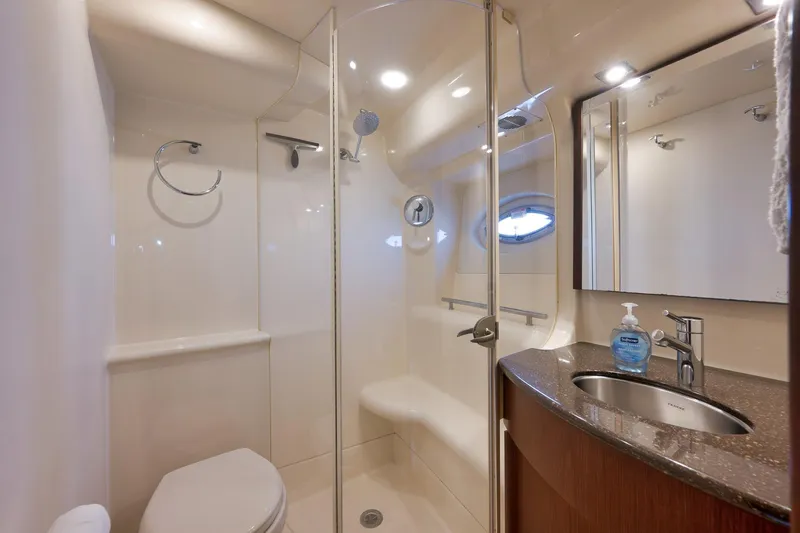 Slide: The Image of Luxurious bathroom in 2012 Meridian 441 Sedan yacht with modern fixtures and elegant design. - 51