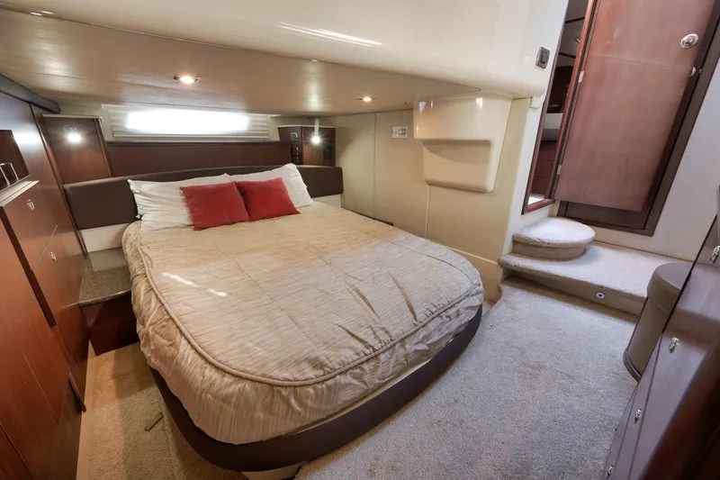 Slide: The Image of Luxurious bedroom interior of 2012 Meridian 441 Sedan yacht with cozy bedding. - 53