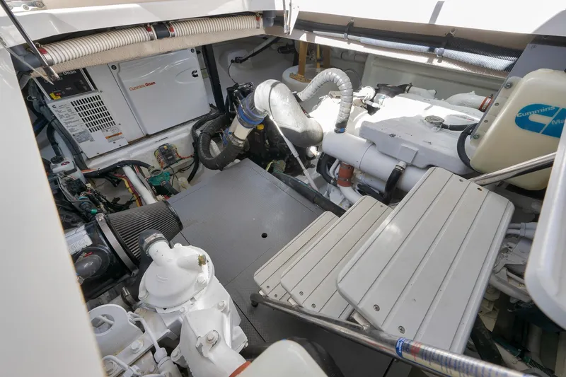 Slide: The Image of Engine room of 2012 Meridian 441 Sedan yacht, featuring Cummins Onan generator. - 81