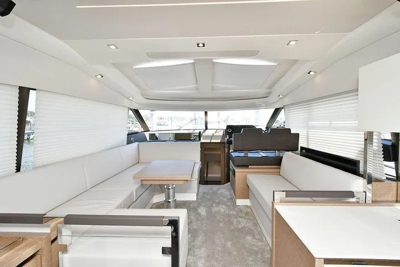 Slide: The Image of Luxurious interior of 2019 Prestige 460 yacht with modern seating and elegant design. - 10