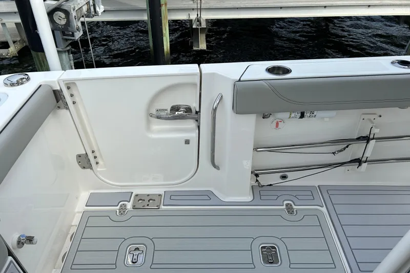 Slide: The Image of 2023 Pursuit S 288 Sport boat interior with sleek design and modern features. - 19