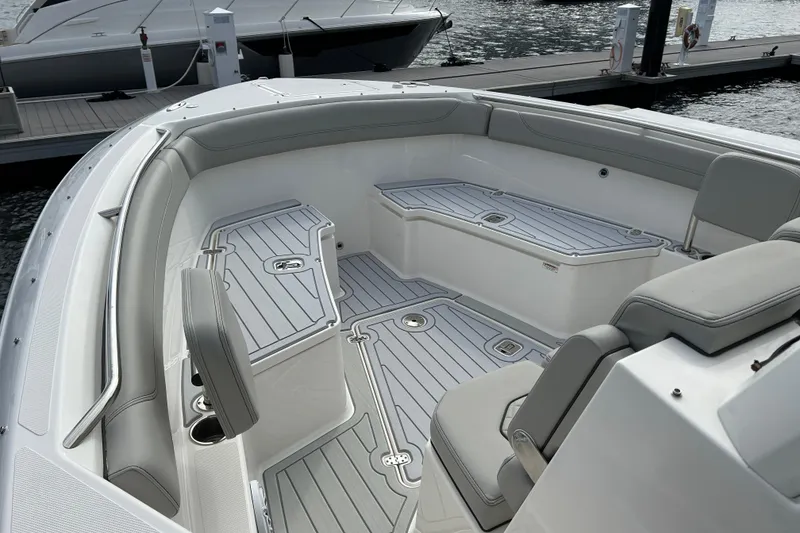 Slide: The Image of 2023 Pursuit S 288 Sport boat interior with sleek seating and modern design. - 39