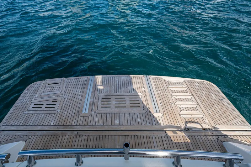 Slide: The Image of 2018 Sea Ray L550 Fly yacht deck with ocean view. - 21