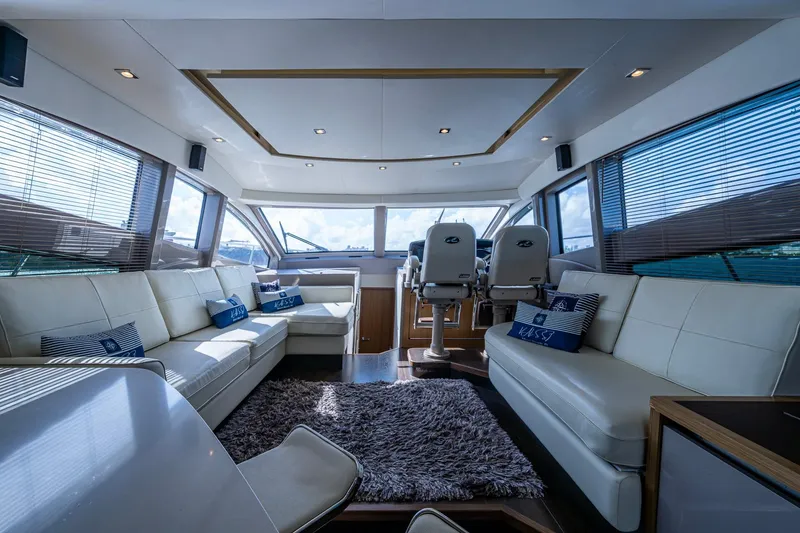 Slide: The Image of Luxurious interior of 2018 Sea Ray L550 Fly yacht with plush seating and modern design. - 30