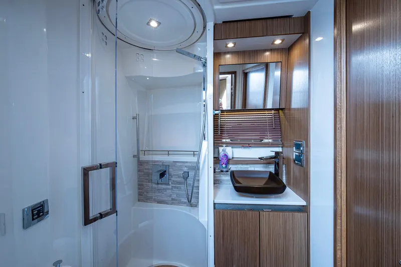 Slide: The Image of Luxurious bathroom interior of 2018 Sea Ray L550 Fly yacht with modern fixtures. - 41