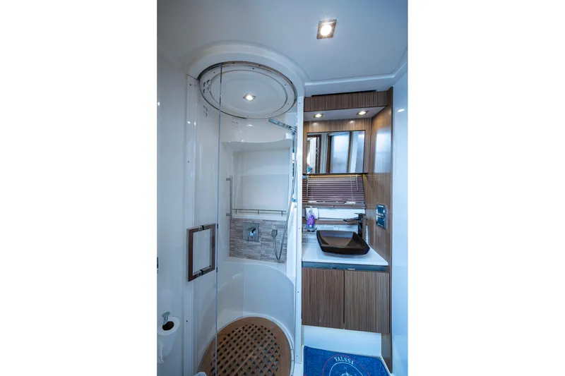 Slide: The Image of Luxurious bathroom in 2018 Sea Ray L550 Fly yacht with modern fixtures and elegant design. - 42