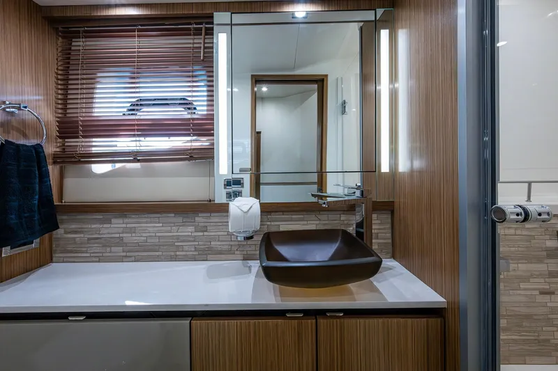 Slide: The Image of Luxurious bathroom interior of 2018 Sea Ray L550 Fly yacht with modern fixtures. - 50