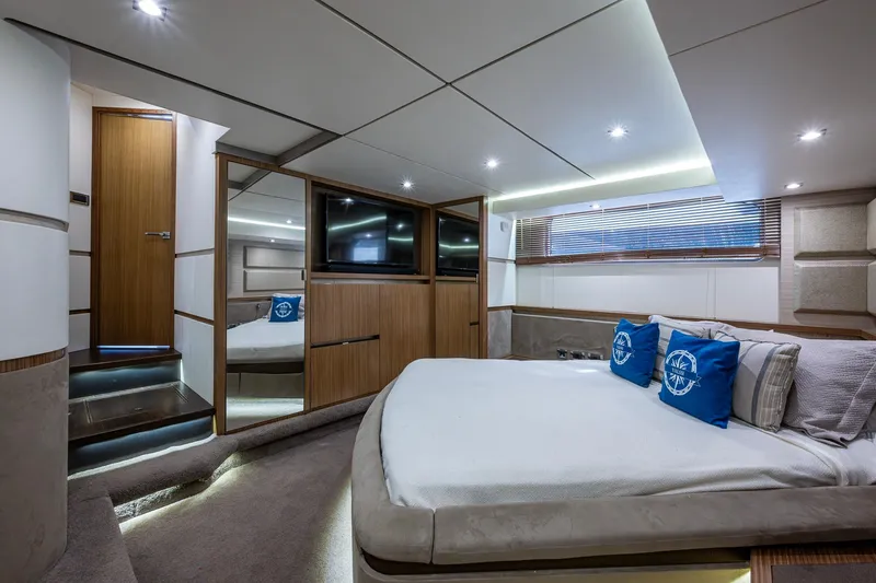 Slide: The Image of Luxurious 2018 Sea Ray L550 Fly yacht bedroom with modern design and ambient lighting. - 54
