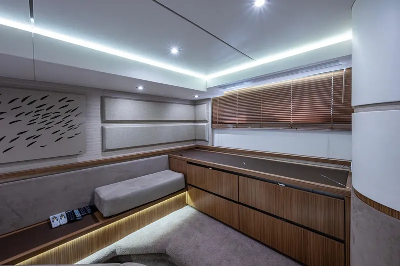 Slide: The Image of Luxurious interior of 2018 Sea Ray L550 Fly yacht with modern design and ambient lighting. - 57
