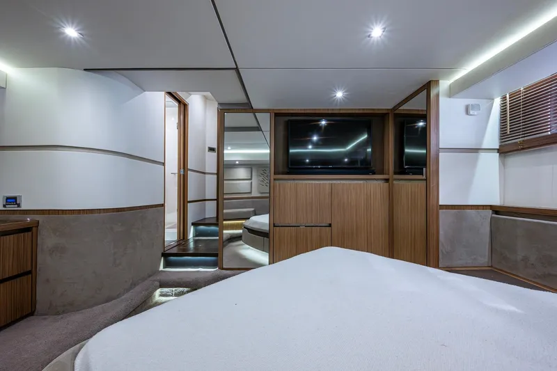 Slide: The Image of Luxurious interior of 2018 Sea Ray L550 Fly yacht with modern wood finishes. - 58
