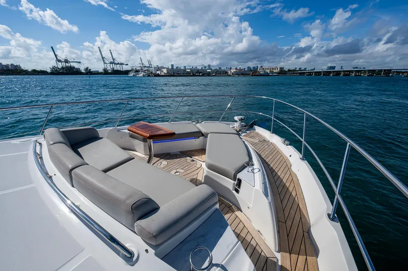 Slide: The Image of Luxurious 2018 Sea Ray L550 Fly yacht with spacious deck and scenic ocean view. - 6