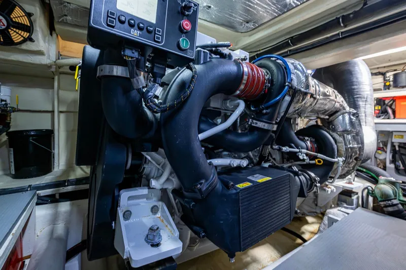 Slide: The Image of Engine room of 2018 Sea Ray L550 Fly yacht, showcasing advanced machinery and components. - 63
