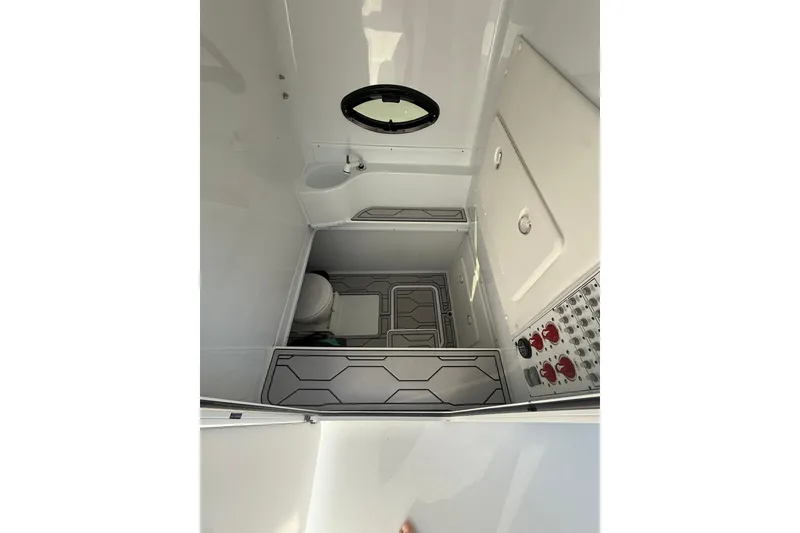Slide: The Image of 2022 Contender 39 ST boat interior with modern bathroom and sleek design. - 16