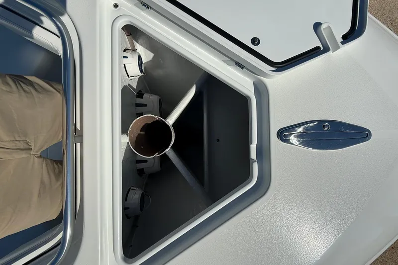 Slide: The Image of Open storage compartment on a 2022 Contender 39 ST boat deck. - 20