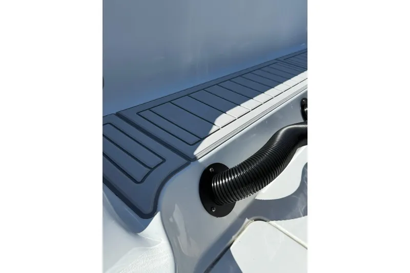 Slide: The Image of 2022 Contender 39 ST boat deck with sleek design and black tubing. - 27