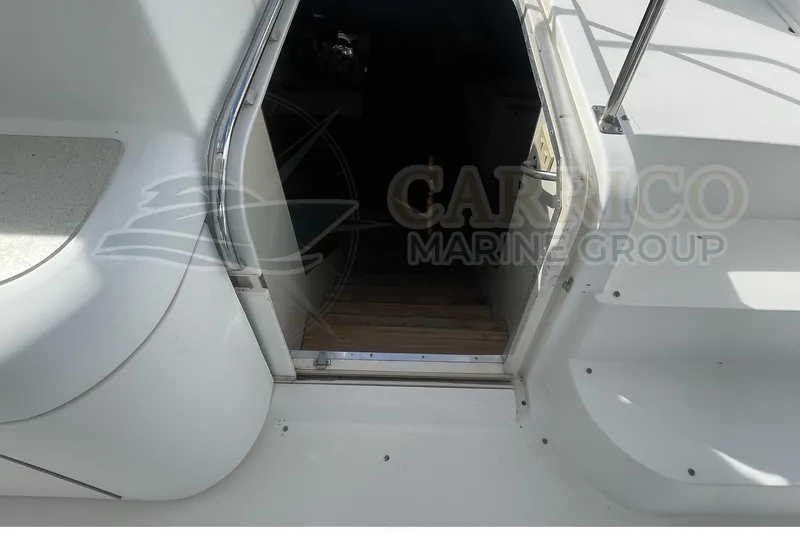 Slide: The Image of 1996 Cruisers Yachts 3650 Aft Cabin entrance with stairs and railing. - 20