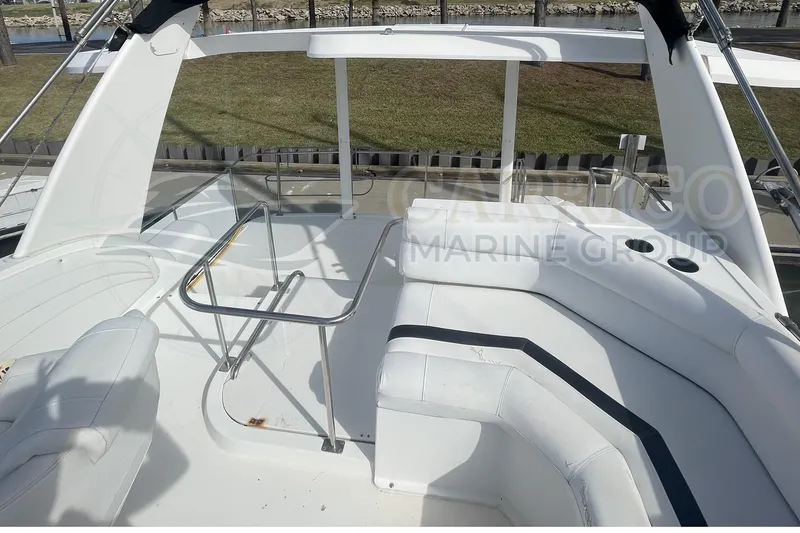 Slide: The Image of 1996 Cruisers Yachts 3650 Aft Cabin with spacious seating and sleek design. - 18