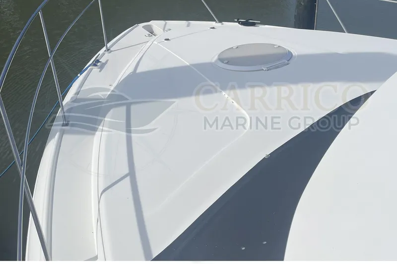 Slide: The Image of 1996 Cruisers Yachts 3650 Aft Cabin boat deck with railing and hatch. - 8