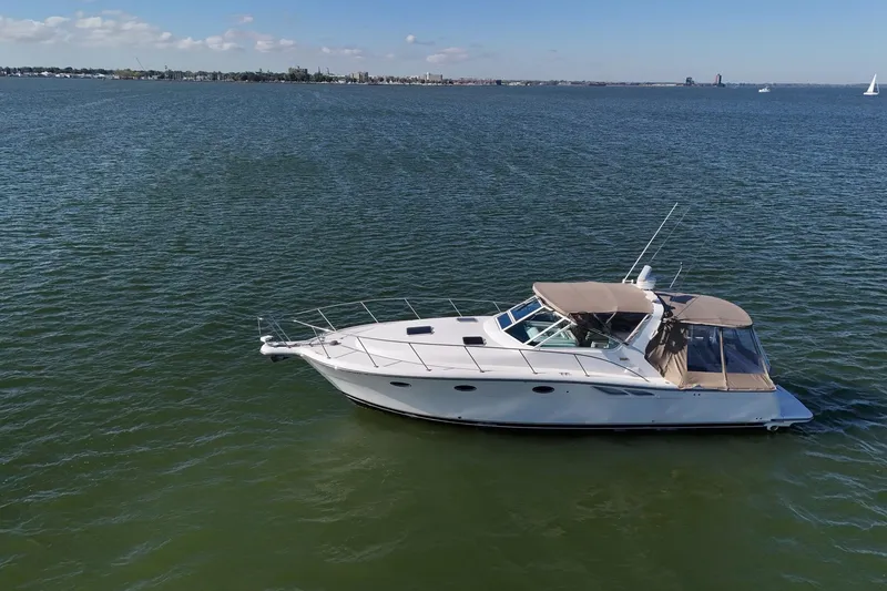 The Image of 2001 Tiara Yachts 3500 Open cruising on calm waters under a clear sky. - 0