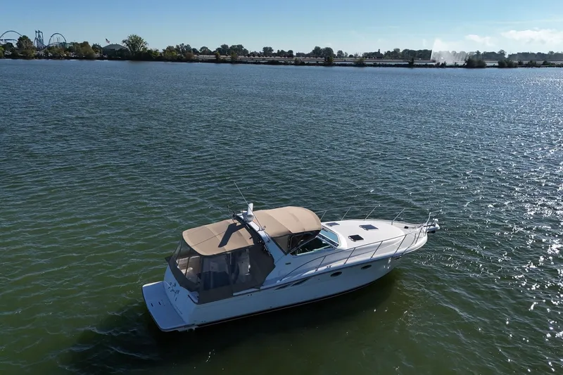 Slide: The Image of 2001 Tiara Yachts 3500 Open interior with seating and carpeted floor. - 1