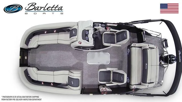 Slide: The Image of 2026 Barletta Boats Cabrio 24UC pontoon, top view, spacious seating, elegant design, American flag. - 6
