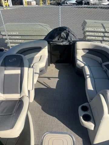 Slide: The Image of 2023 Barletta Boats C20Q pontoon interior with plush seating and cup holders. - 3
