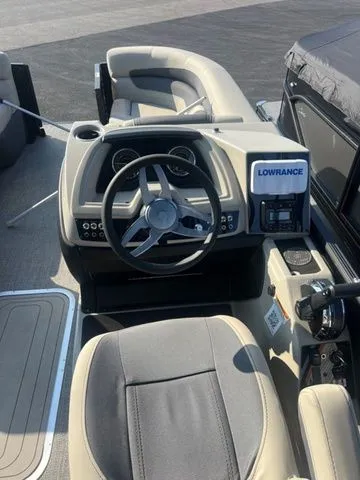 Slide: The Image of Captain's helm of 2023 Barletta Boats C20Q with Lowrance navigation system. - 4