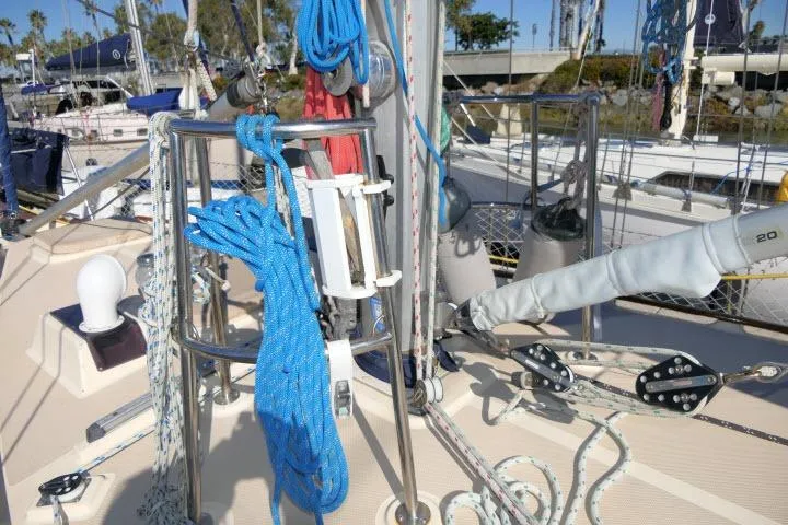 Slide: The Image of Deck of 1999 Island Packet 45 sailboat with ropes and rigging equipment. - 39