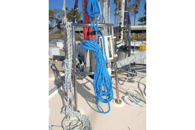 Slide: The Image of Sailing ropes on deck of 1999 Island Packet 45 yacht, featuring blue and white lines. - 40