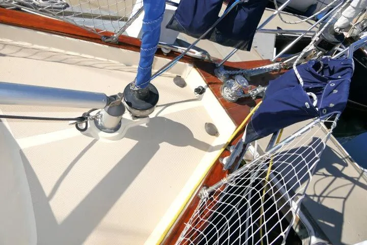 Slide: The Image of Deck of 1999 Island Packet 45 sailboat with rigging and netting details. - 42