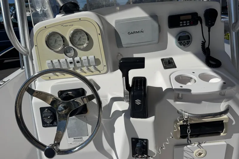Slide: The Image of Control panel of a 2006 PROLINE 23 boat with Garmin navigation system. - 21