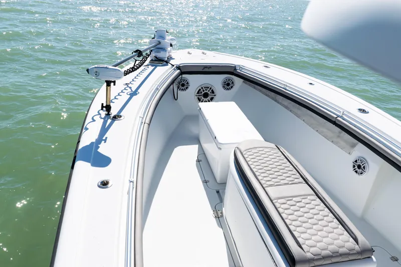 Slide: The Image of 2019 Yellowfin 36 Offshore boat interior with seating and ocean view. - 15