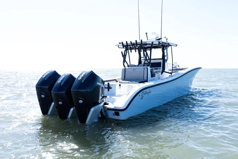 Slide: The Image of 2019 Yellowfin 36 Offshore boat on open water under blue sky. - 2