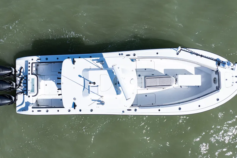 Slide: The Image of Overhead view of 2019 Yellowfin 36 Offshore boat on water. - 8