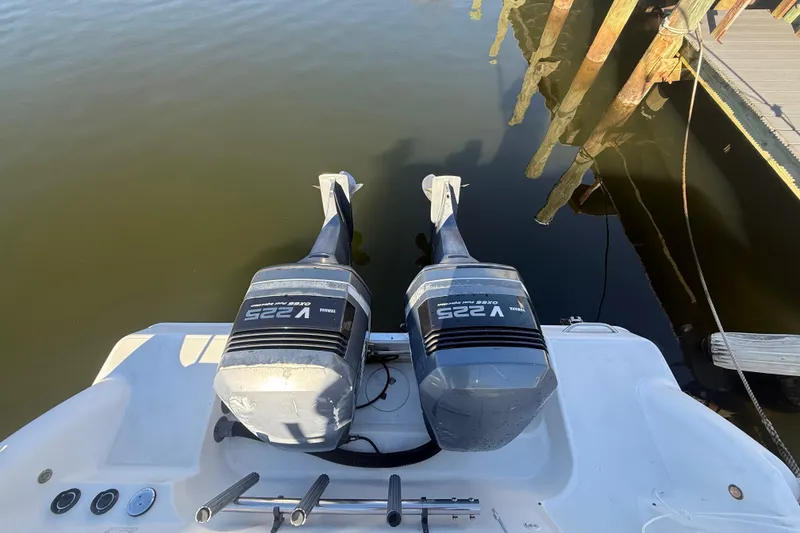 Slide: The Image of 2002 Wellcraft 290 Coastal boat with twin Yamaha V225 outboard engines at dock. - 10