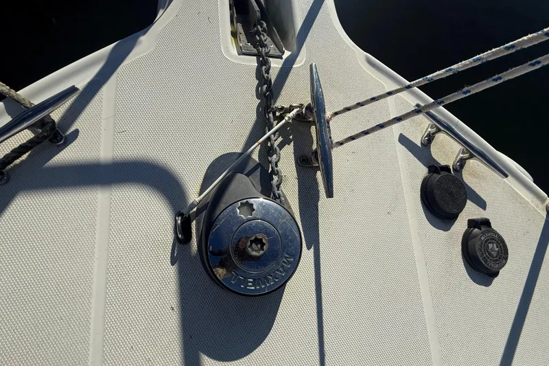 Slide: The Image of Bow of 2002 Wellcraft 290 Coastal boat with anchor chain and cleats. - 14