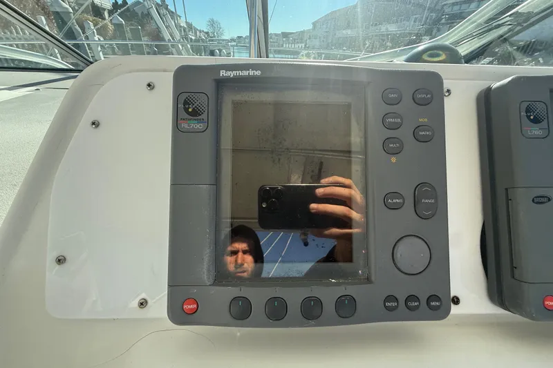Slide: The Image of Raymarine Pathfinder RL70C display on 2002 Wellcraft 290 Coastal boat dashboard. - 18