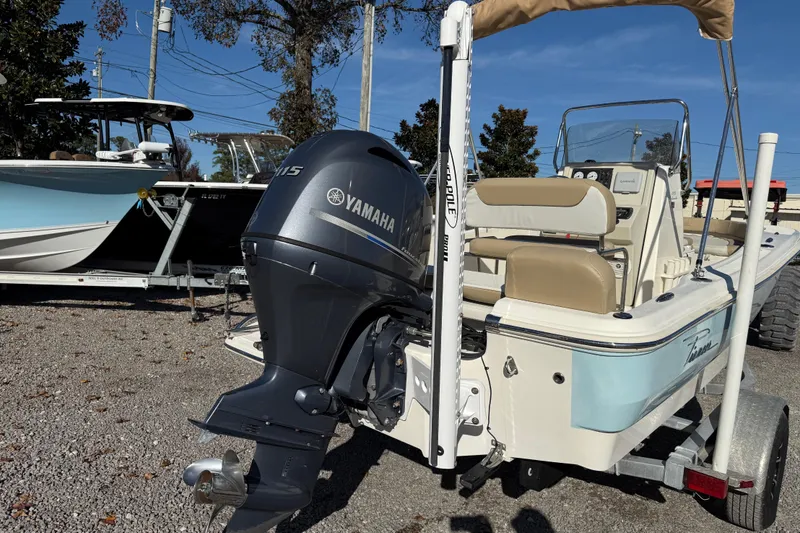 Slide: The Image of 2016 Pioneer 180 Islander boat with Yamaha outboard motor on trailer. - 4
