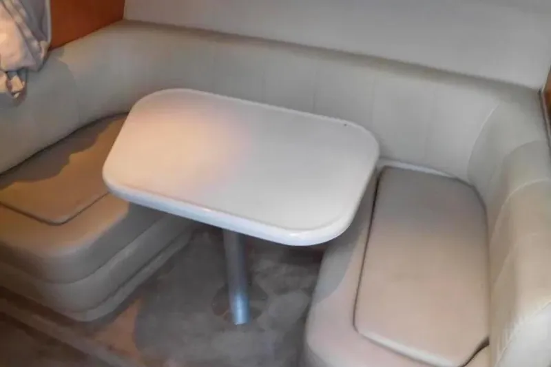 Slide: The Image of 2001 Regal Commodore 2960 interior with beige seating and table. - 9