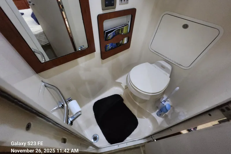Slide: The Image of Bathroom interior of 2004 Sea Ray 390 Motor Yacht with toilet and mirror. - 22