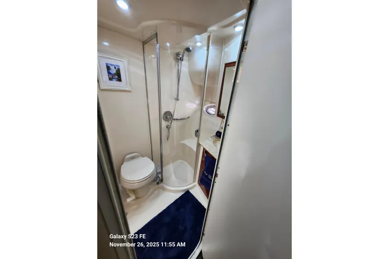 Slide: The Image of Bathroom interior of 2004 Sea Ray 390 Motor Yacht with shower and toilet. - 32