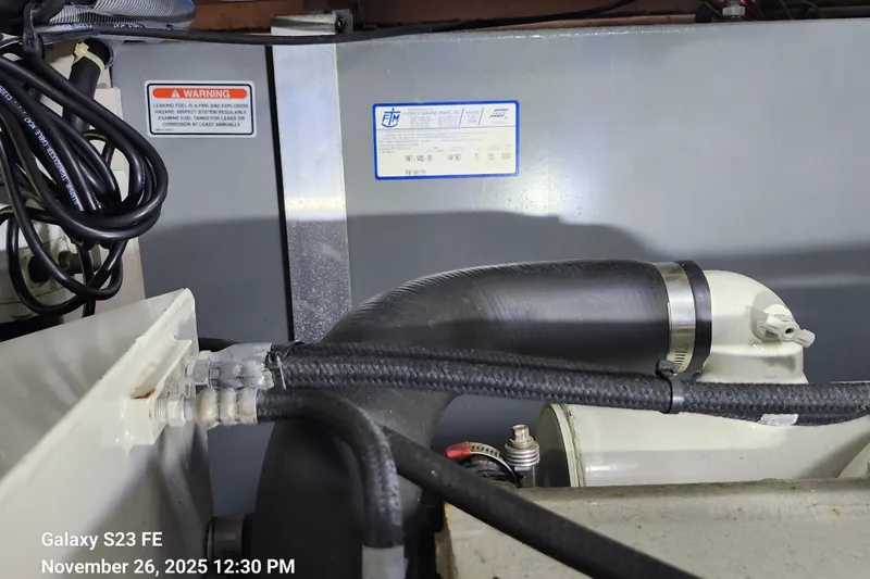 Slide: The Image of Engine compartment of a 2004 Sea Ray 390 Motor Yacht, fuel tank #1 - 150 gal. - 54