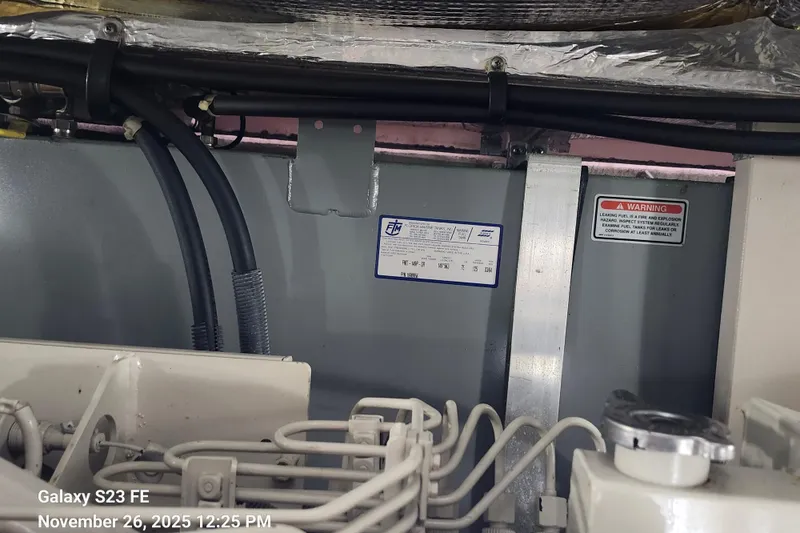 Slide: The Image of Engine room of 2004 Sea Ray 390 Motor Yacht, fuel tank #2 - 150 gal. - 55