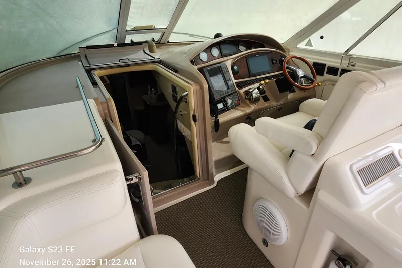 Slide: The Image of Magnolia Belle helm station showing companionway access to main salon and cabin spaces. - 7