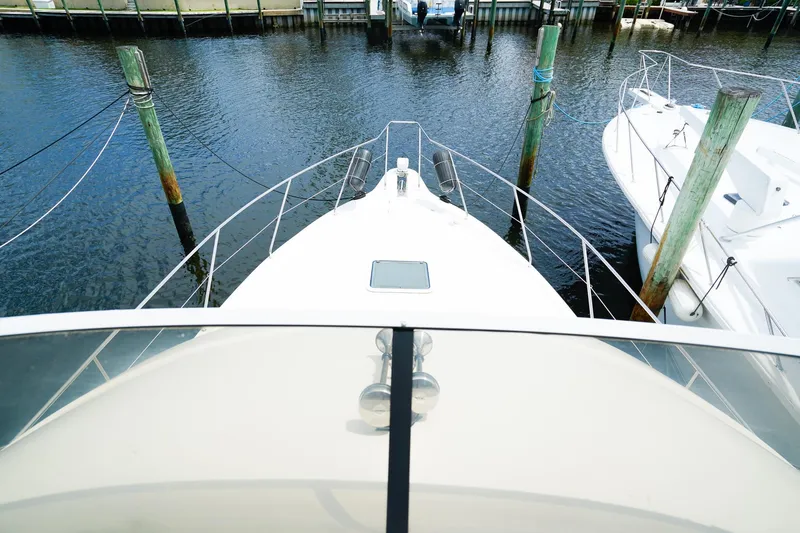 Slide: The Image of 2002 Silverton 352 Motor Yacht docked at marina, viewed from above. - 20