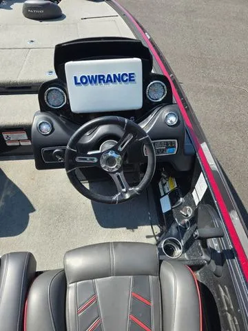 Slide: The Image of 2018 Nitro Z21 boat dashboard with Lowrance electronics and steering wheel. - 7