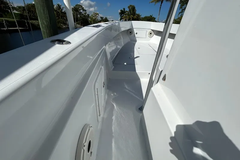 Slide: The Image of Control panel of a 2006 Whitewater 28 boat with Garmin displays and Suzuki equipment. - 11